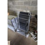 A parcel shelf, a metal clothes airer and a metal