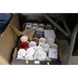 A box of various mugs