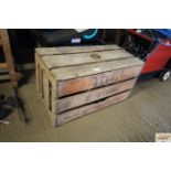 A vintage wooden slatted egg crate