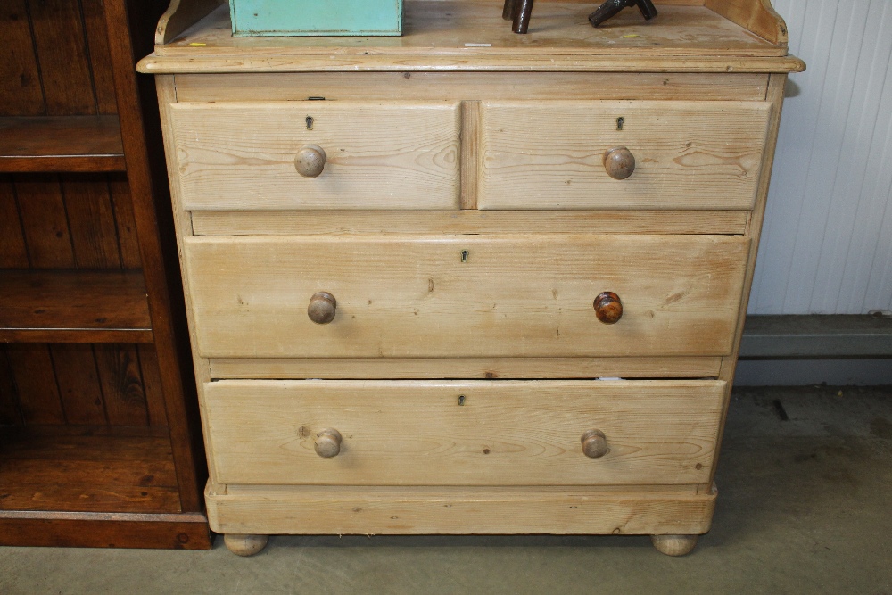 A stripped pine chest fitted two short over two lo