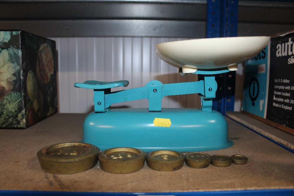 A set of kitchen scales and weights