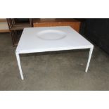 A mid 20th Century Formica topped coffee table rai