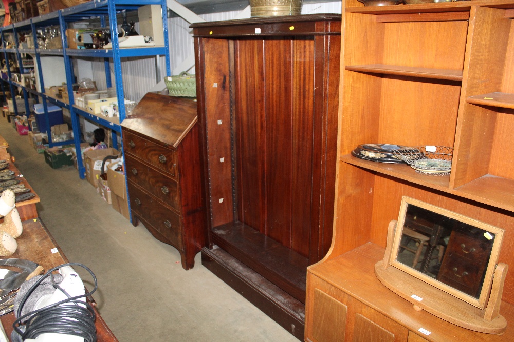 A mahogany and pine open fronted bookcase with adj