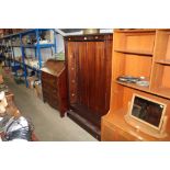 A mahogany and pine open fronted bookcase with adj