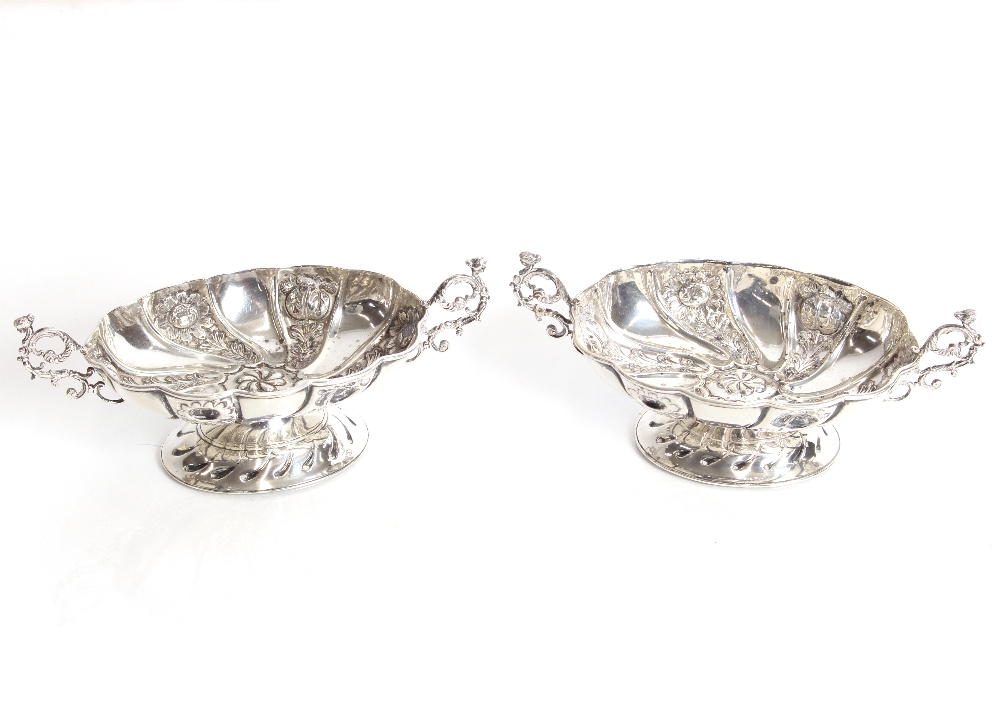 A near pair of late Victorian silver bonbon dishes