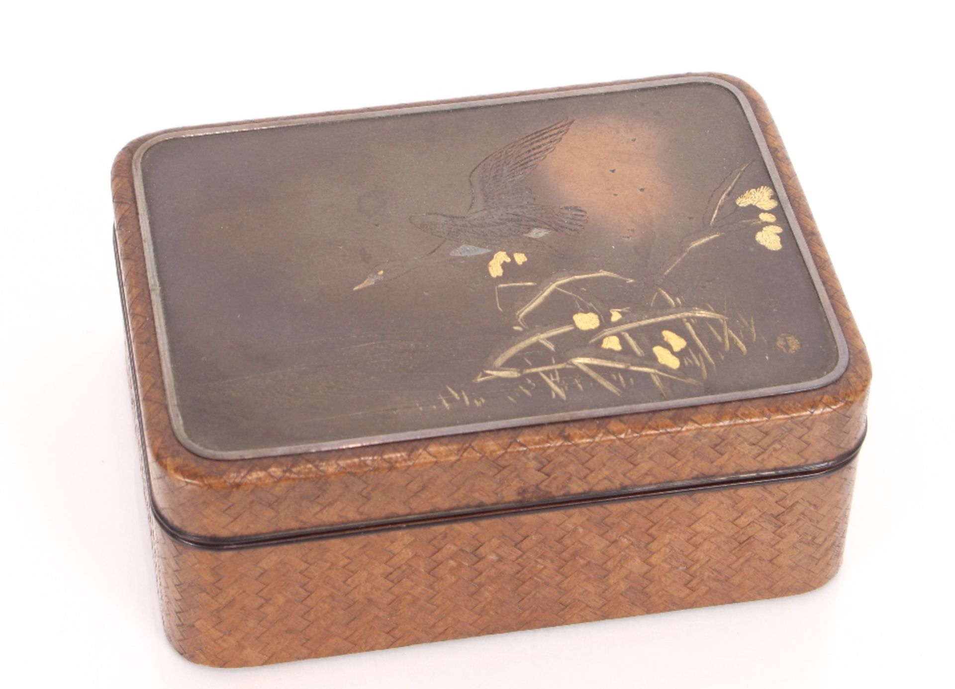 A Japanese lacquered box, the lid decorated duck i