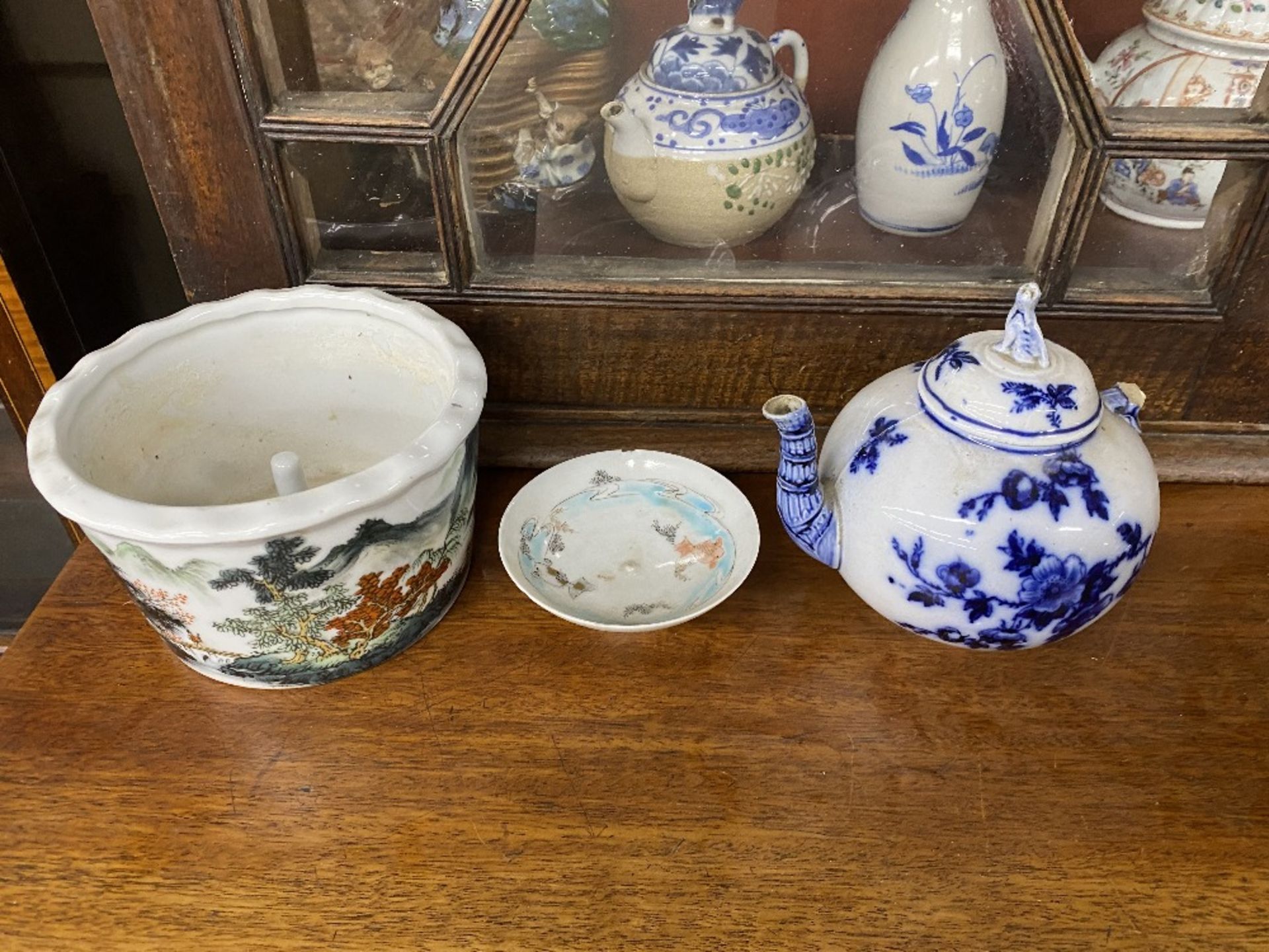 A 18th century Chinese famille rose teapot decorated with figures; an oriental blue and white floral - Image 3 of 6