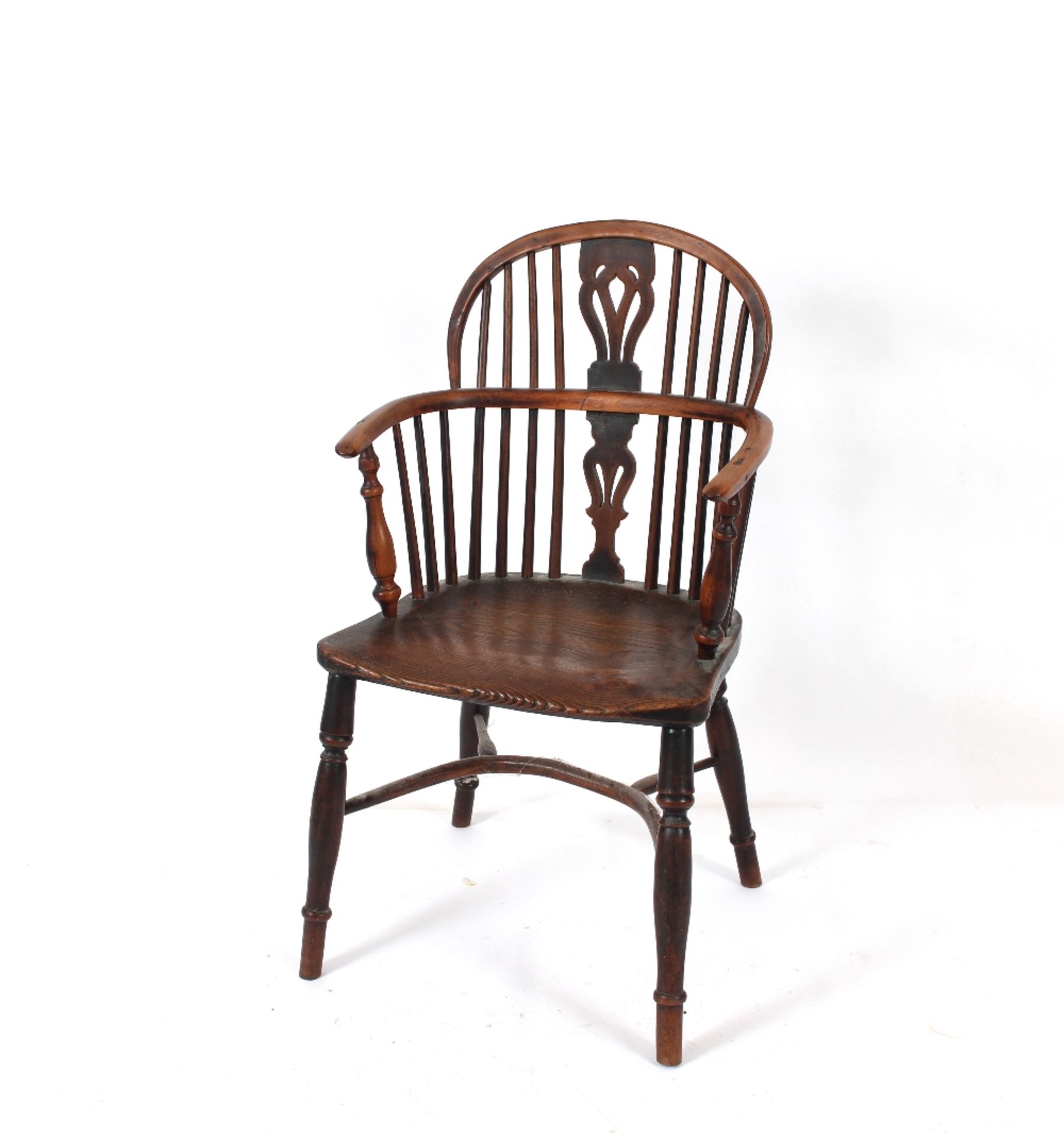 A 19th century yew wood and elm seated Windsor elb