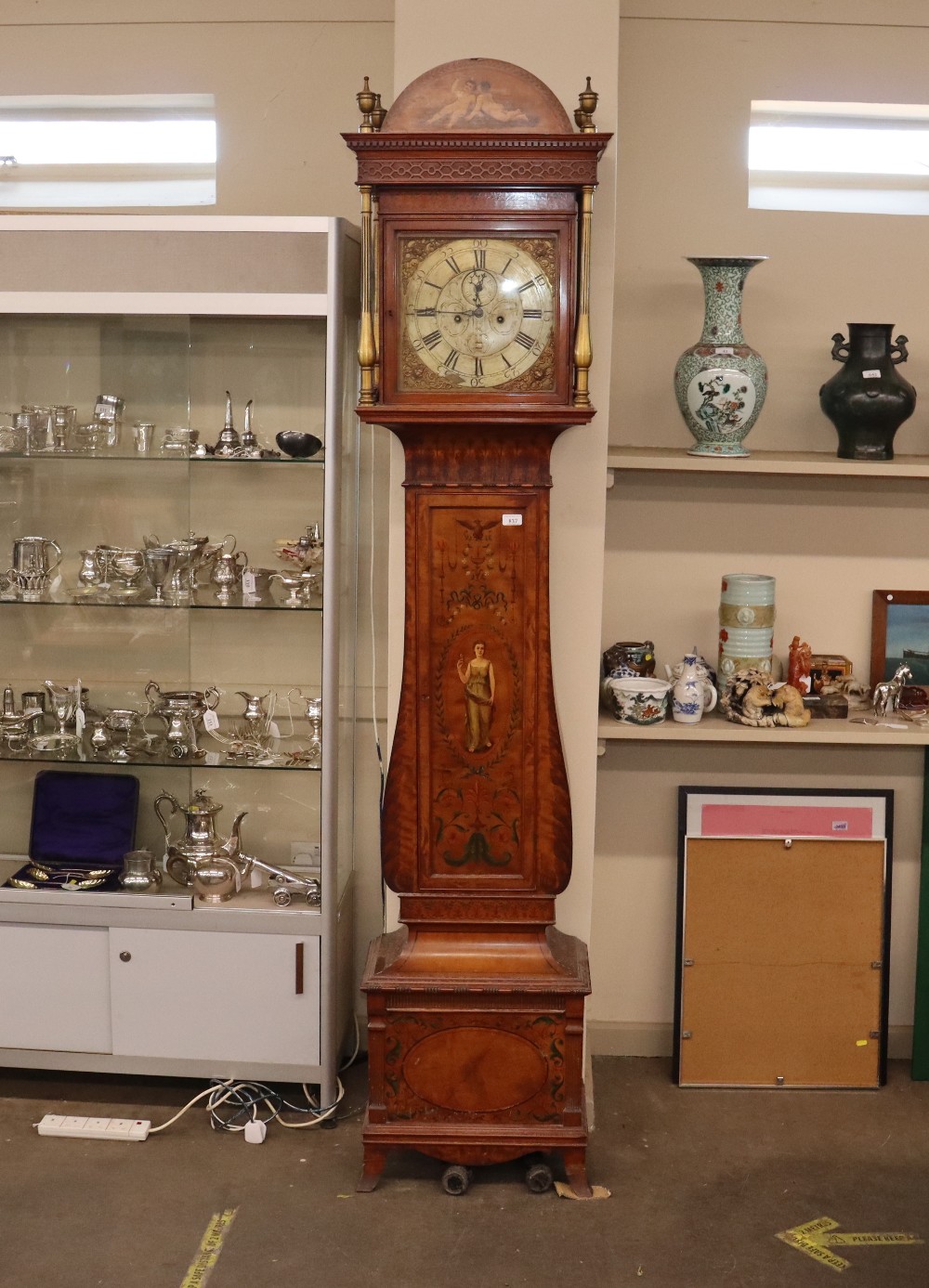 A late 19th century satinwood longcase clock, having inlaid and painted decoration of classical