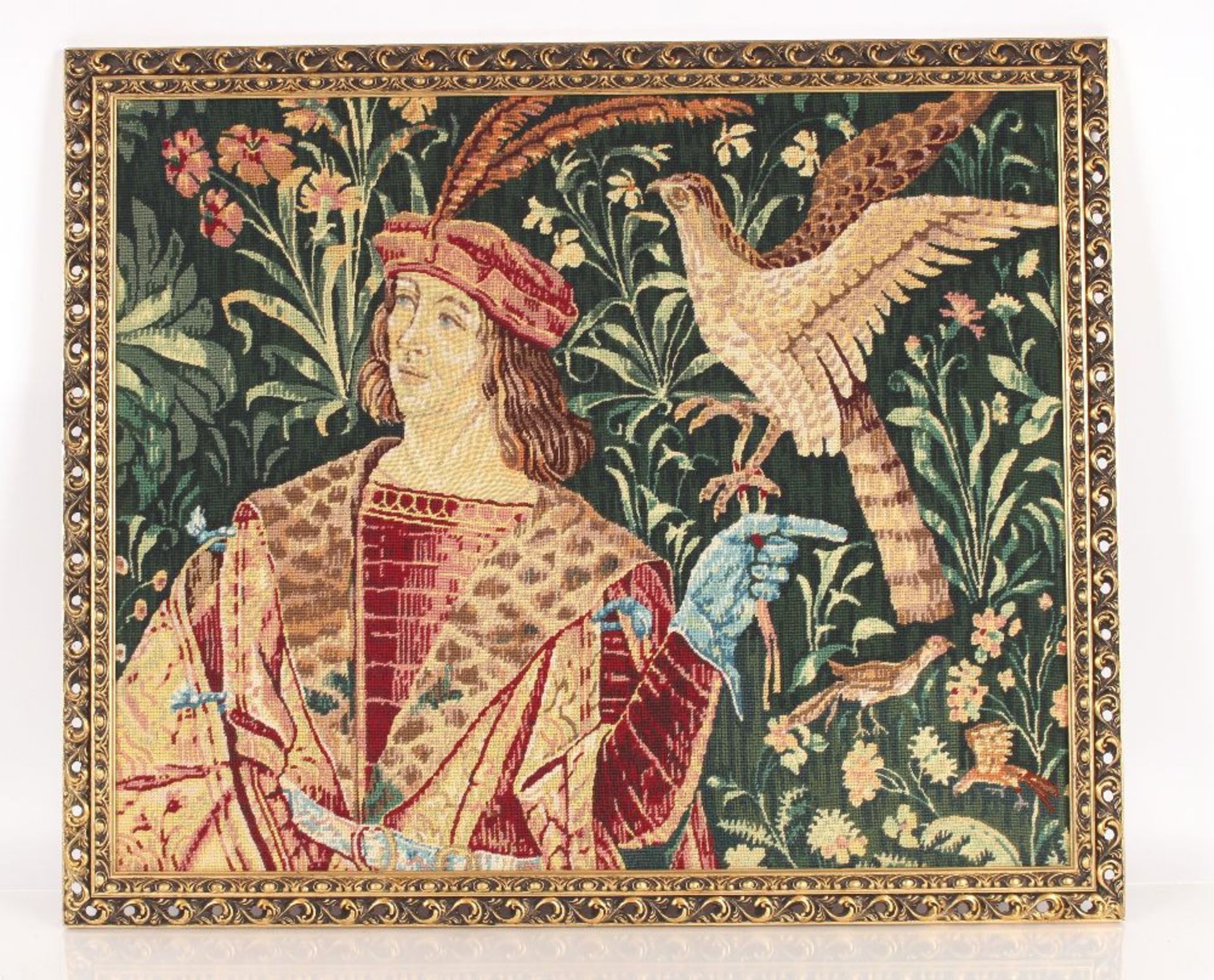 A tapestry picture depicting a Medieval dressed ge