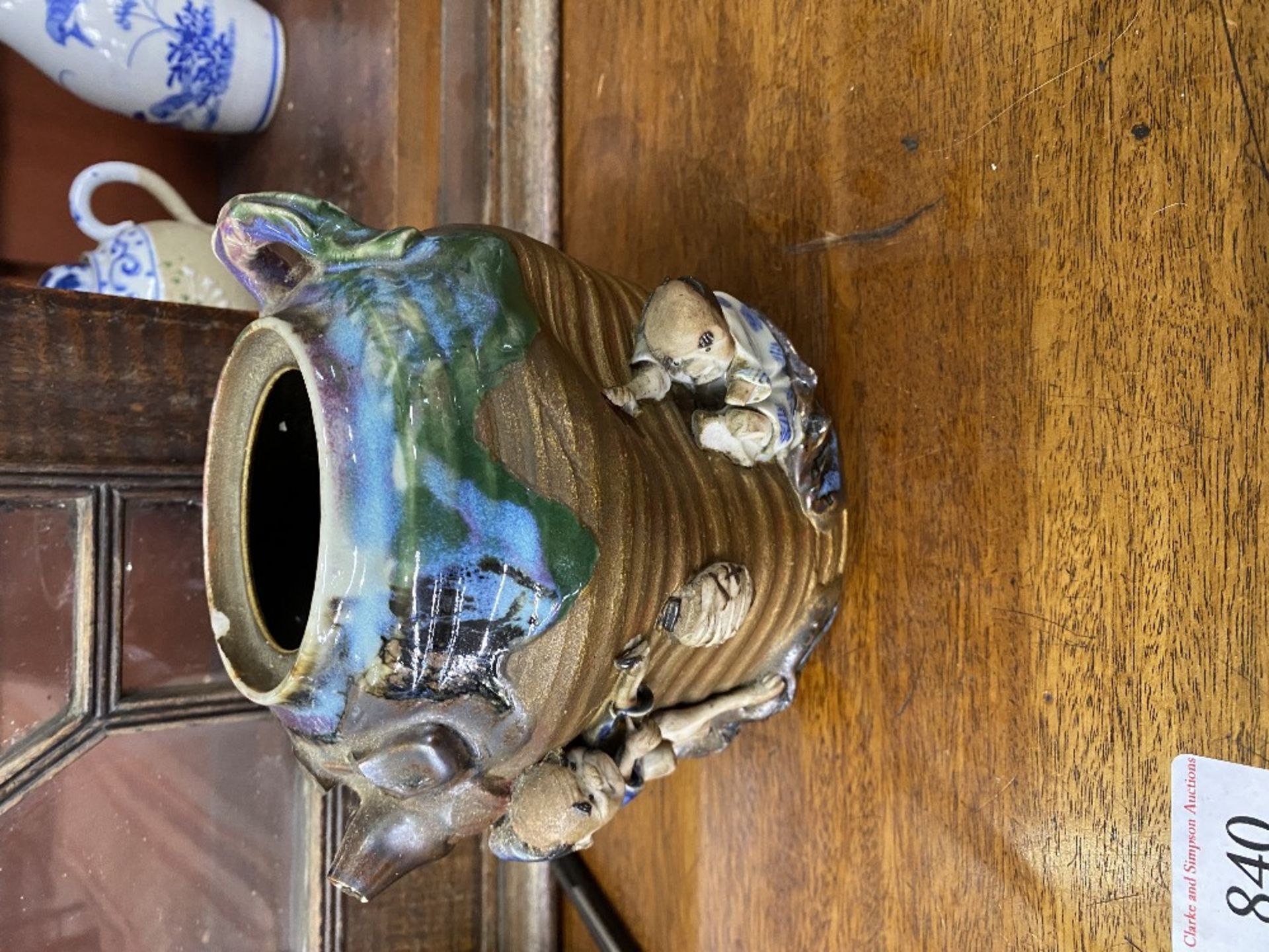 A 18th century Chinese famille rose teapot decorated with figures; an oriental blue and white floral - Image 5 of 6