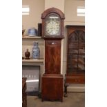 A mahogany chequer banded and cross banded longcase clock with arched hood, enclosing a painted dial