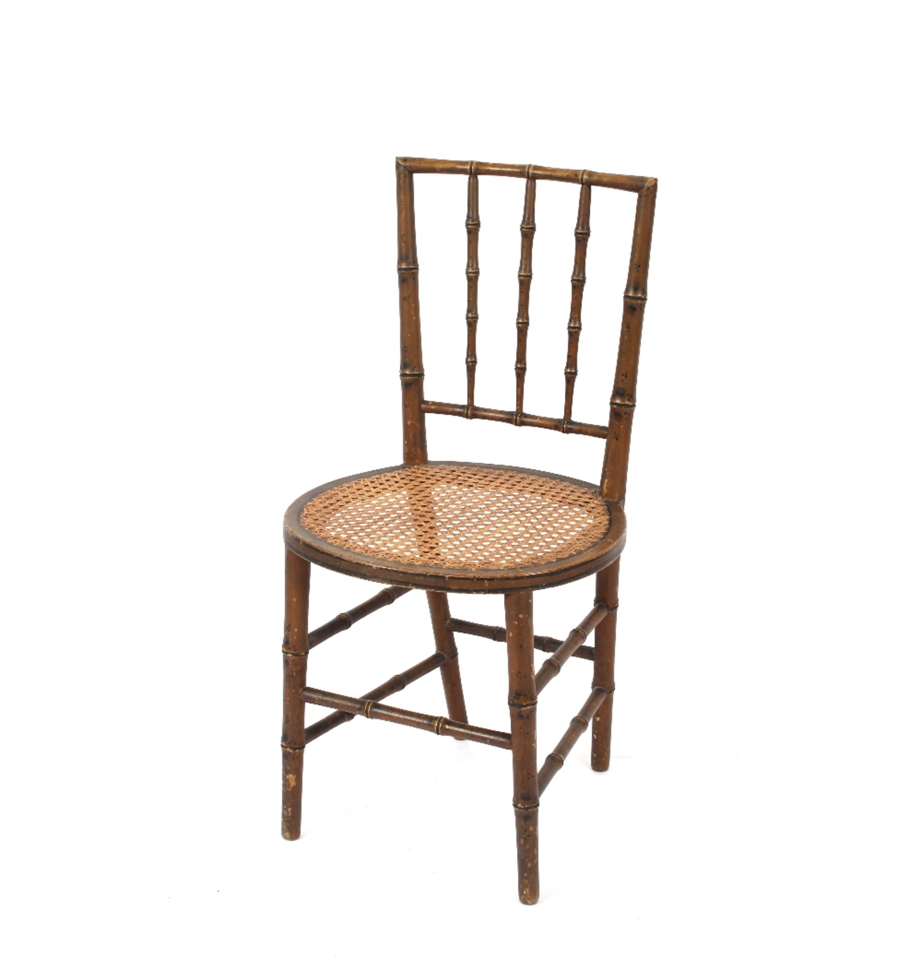 A Regency simulated bamboo side chair with cane se