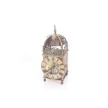 A brass lantern clock having twin fusee movement,