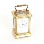 A brass cased carriage timepiece by TE Hen Ltd, Wo