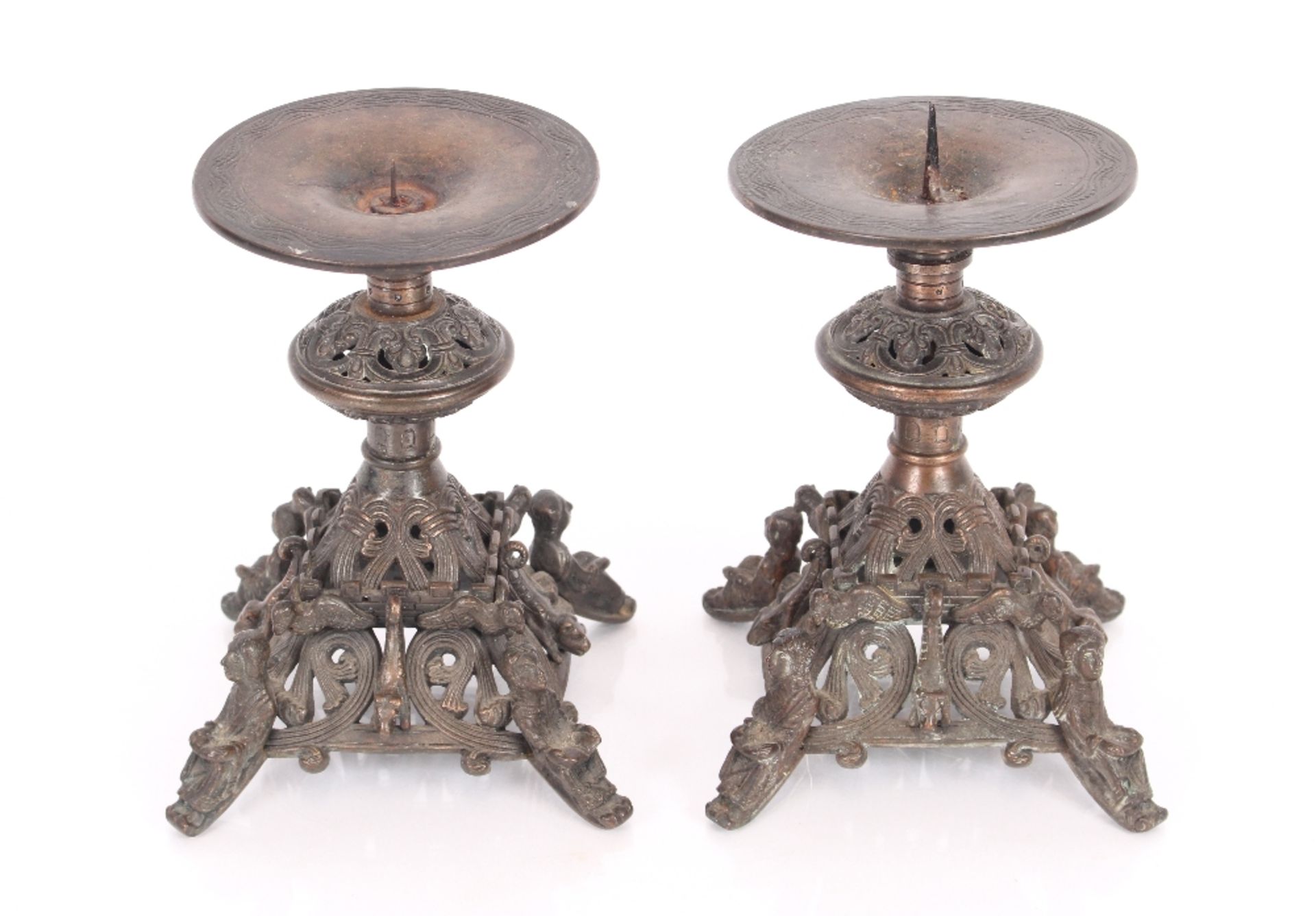 A pair of cast metal Coalbrookdale style pricket candlesticks, 17cm high