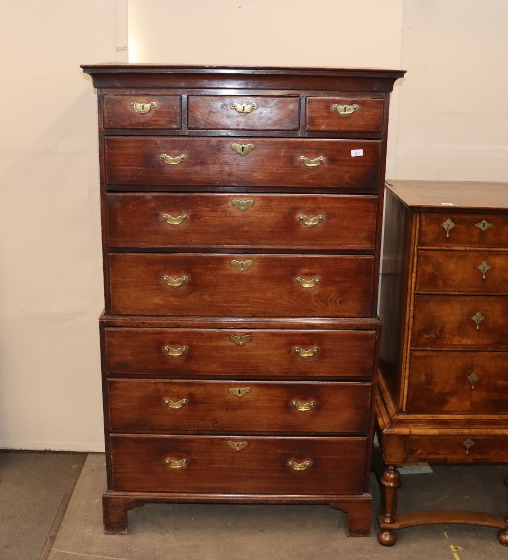 A George III mahogany chest on chest, the upper se