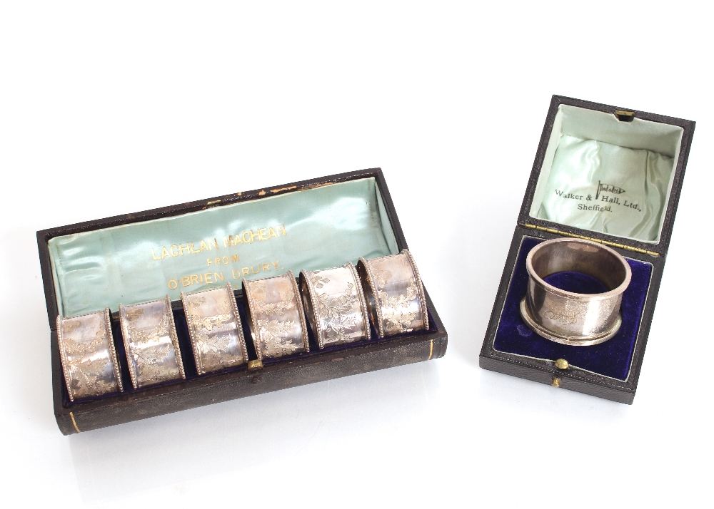 A Victorian cased set of six silver napkin rings,