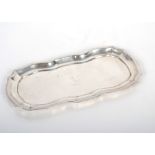 A rare George I silver spoon tray with shaped bord