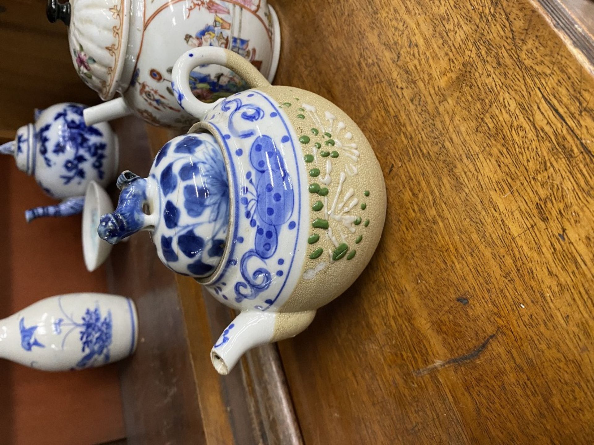 A 18th century Chinese famille rose teapot decorated with figures; an oriental blue and white floral - Image 4 of 6