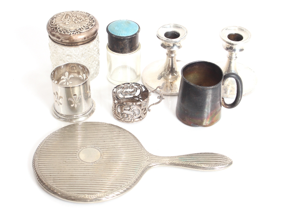 A small silver mug, Sheffield 1930; a pair of silv