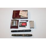 Two Conway Stewart fountain pens and two Ronson lighters