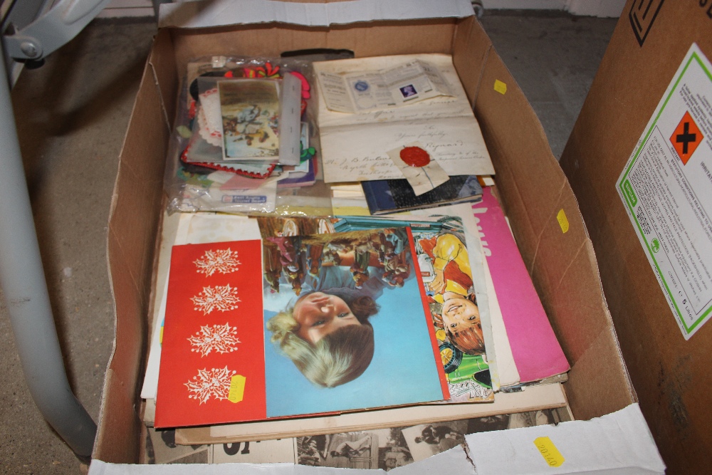 A box containing various ephemera; scrap book etc