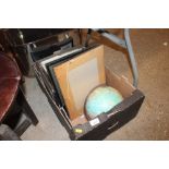 A box containing a world globe; prints etc