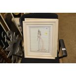 Three framed fashion prints