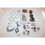 A bag of vintage costume jewellery clip earrings