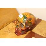 An amber coloured skull