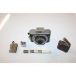 A tin plate Model Wonder camera, cigarette lighter