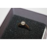 An 18ct gold and solitaire diamond ring, diamond a