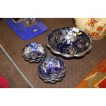 A quantity of blue glass and silver overlay bowls