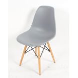 Four Eames style dining chairs