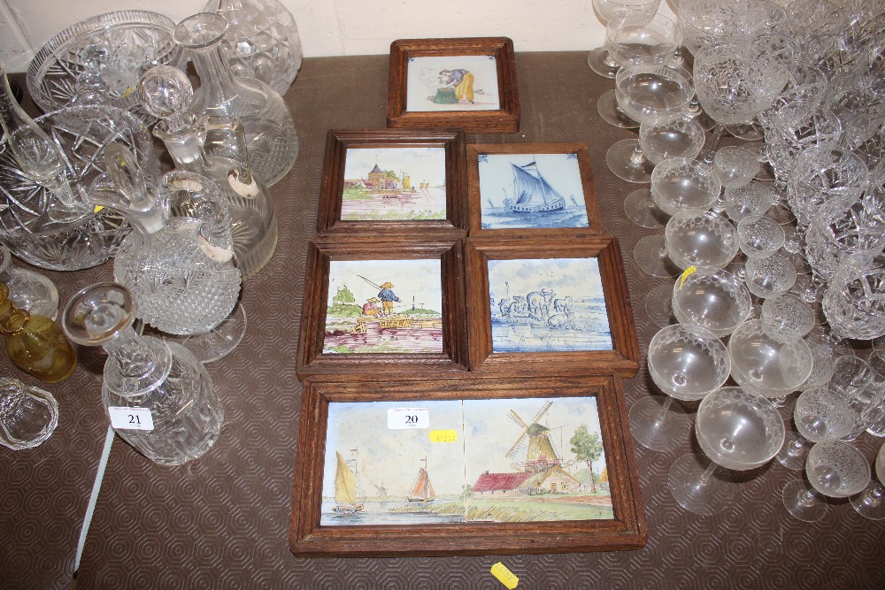 A quantity of framed Delft tiles