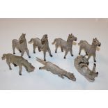 A collection of crackle glazed model horses