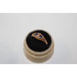 An 18ct gold ring set sapphire and diamonds, approximately 2.5g