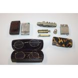 A spectacle case containing two pairs of spectacle