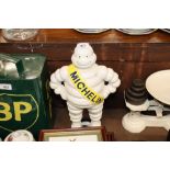 A cast iron Michelin Man advertising figure