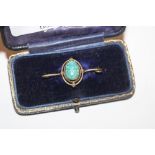 A yellow metal mounted turquoise coloured scarab beetle brooch