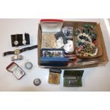 A box containing various costume jewellery includi