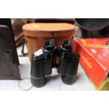 A pair of Century 7 x 50 binoculars with case