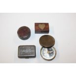 A box containing matchbox, compass, trinket box et