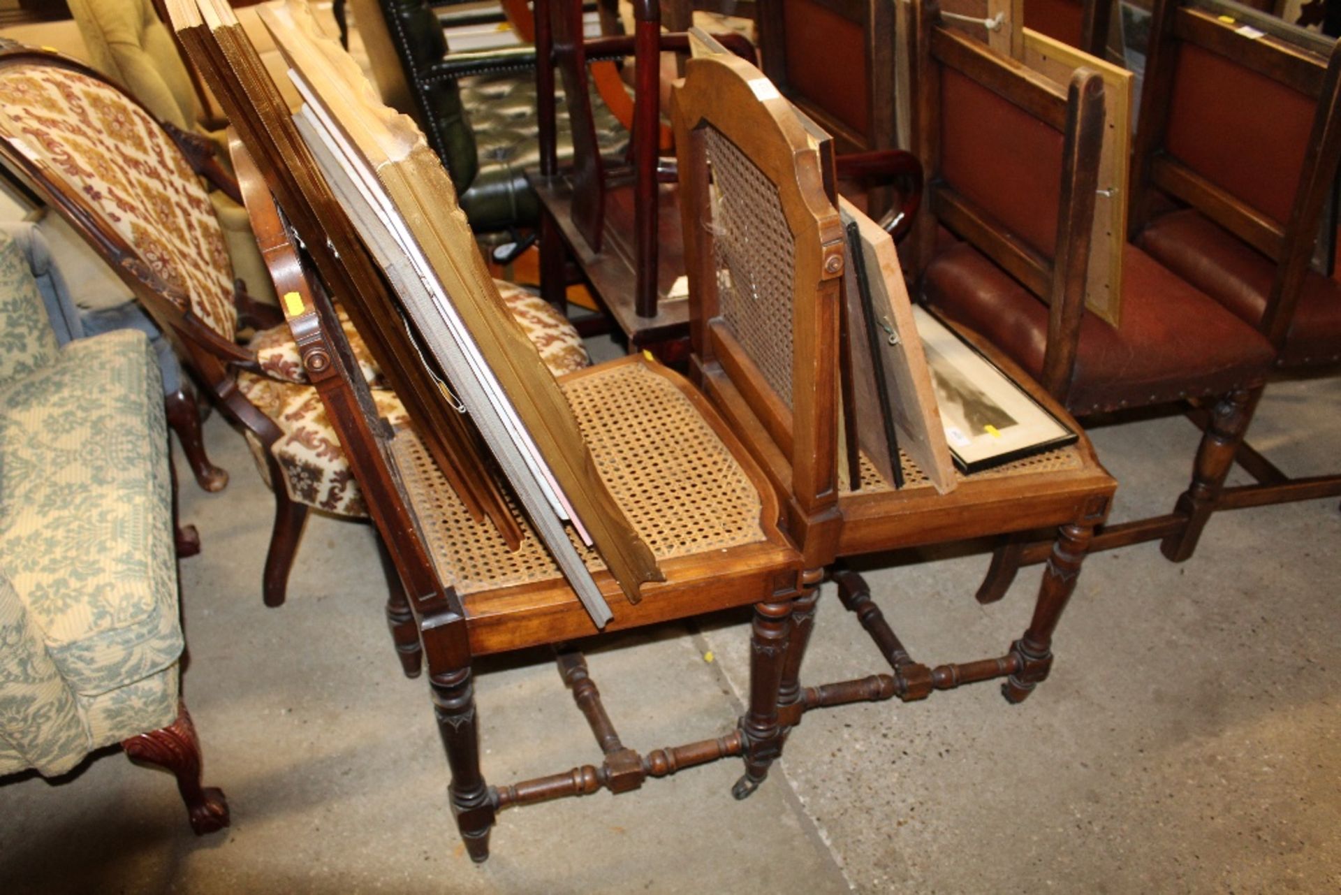 A pair of French walnut and cane upholstered side