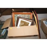 A box containing miscellaneous pictures and prints