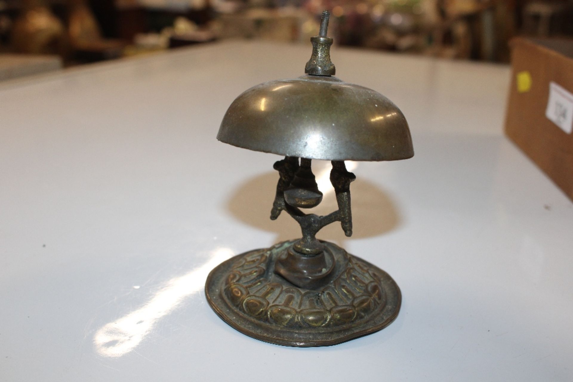 A box containing a brass reception bell, small orn - Image 3 of 5
