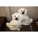 A large pair of Staffordshire spaniel ornaments (e