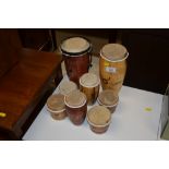 A collection of various small bongo drums