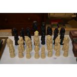 A set of resin Medieval design chess pieces (on King missing)